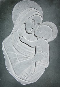 Hand carved green slate relief Madonna and child