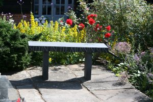 hand carved riven welsh slate bench by Martin Cook