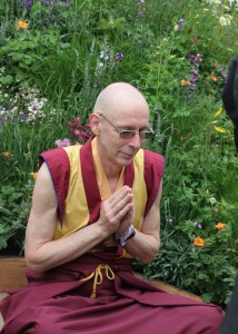 Gen Kelsang Sangye meditates on Martin Cooks Mindfulness Garden RHS Chelsea Flower Show