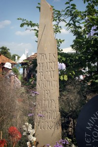 Hand carved York stone standing sundial - poem and carving by Martin Cook