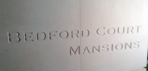 Hand carved and indvidiual design architectural lettering in Portland Stone